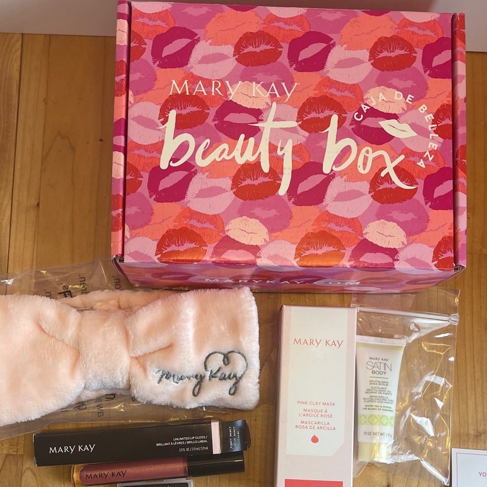 Mary Kay Beauty Box with Pink Lip Gloss and Skincare Essentials